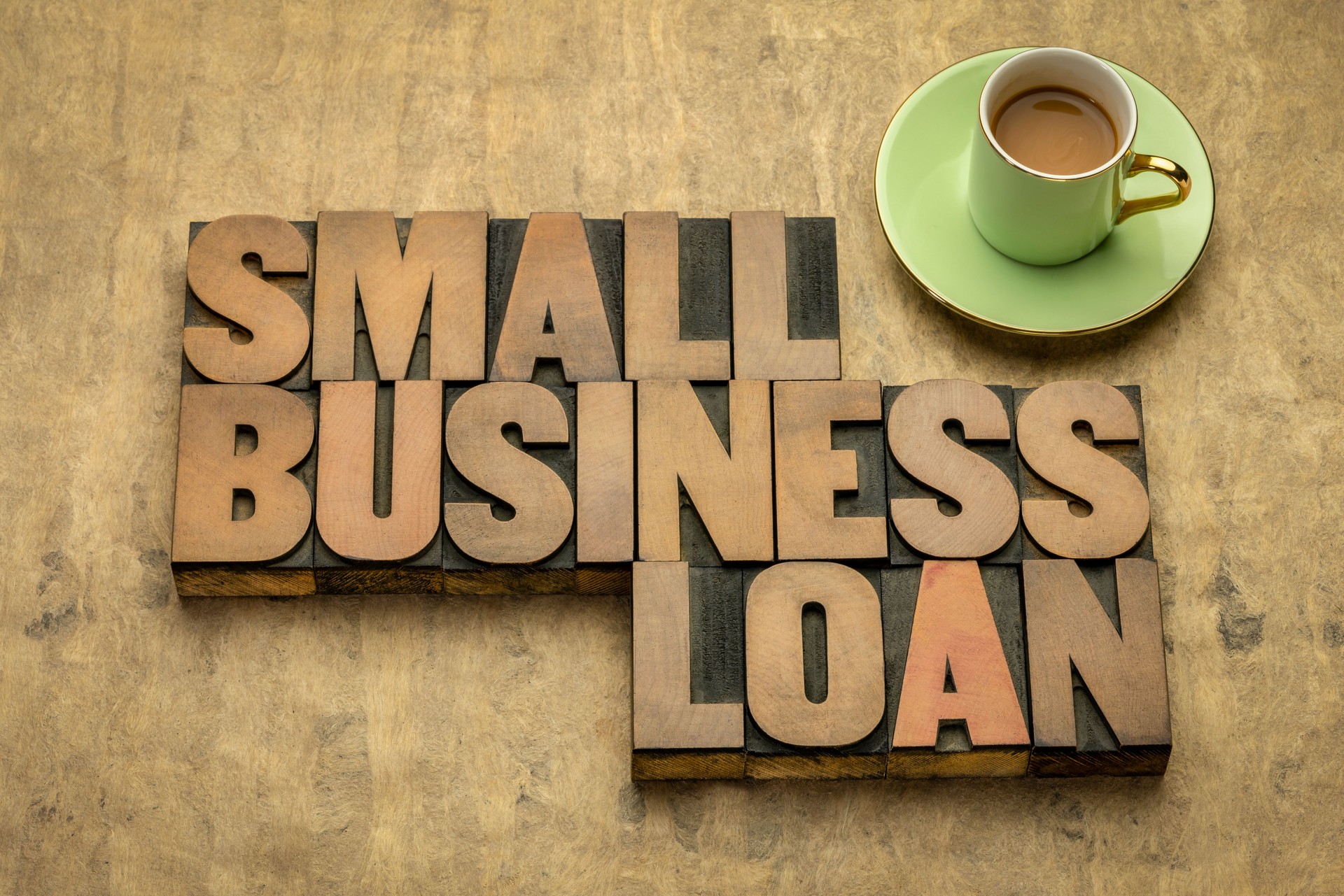 small business loan word abstract in wood type